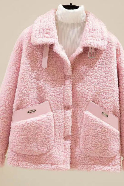 Pink sherpa jacket on a mannequin against a neutral background
