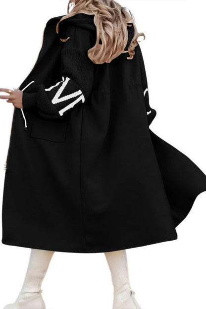 Black coat with white lettering on a white background