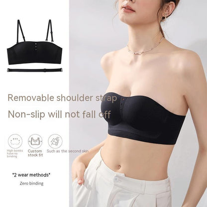 Black strapless bra with removable shoulder straps worn by a model on a white background