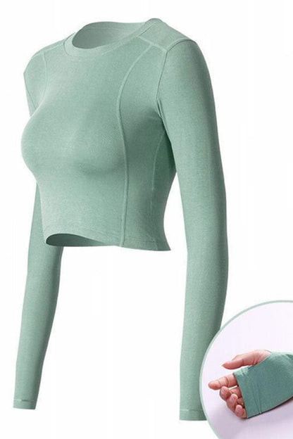 Green long-sleeve top on a white background