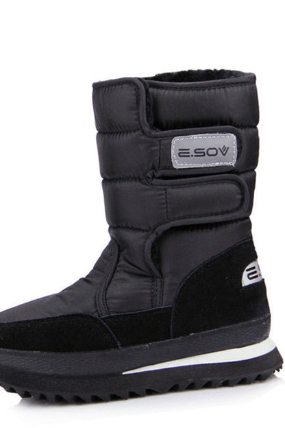 Black winter boot with brand logo on a white background