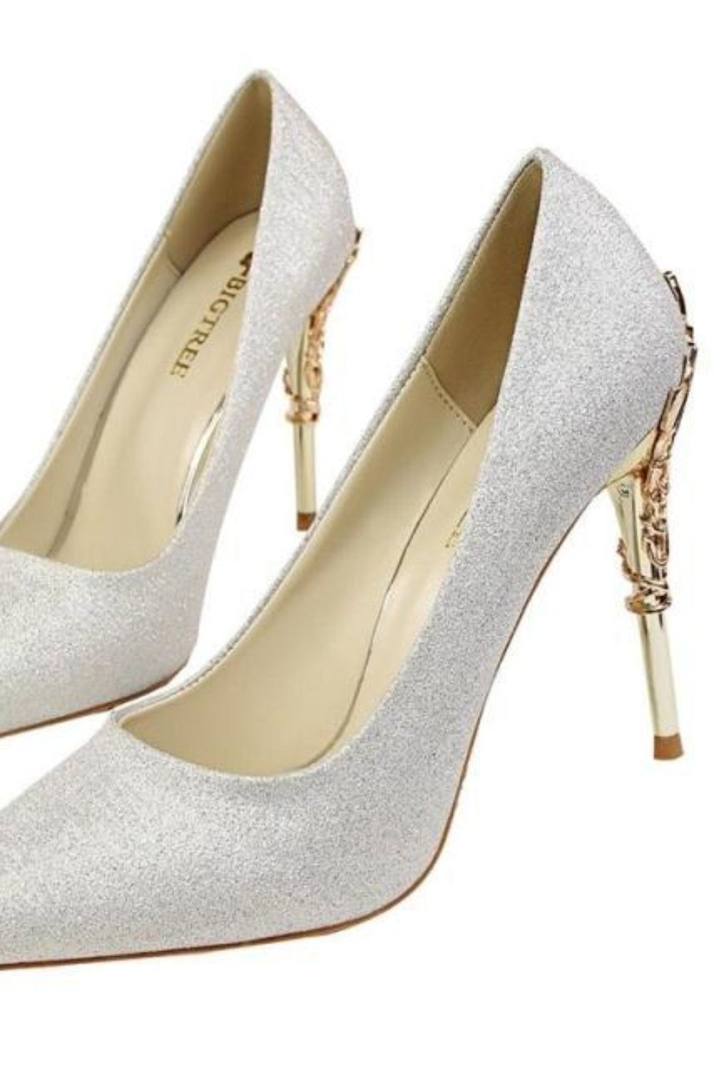Pair of silver glitter high heels on a white background