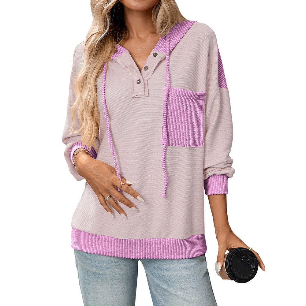 Contrast Color Twist Strip Hoodie – Cozy Street Style with a Trendy Edge