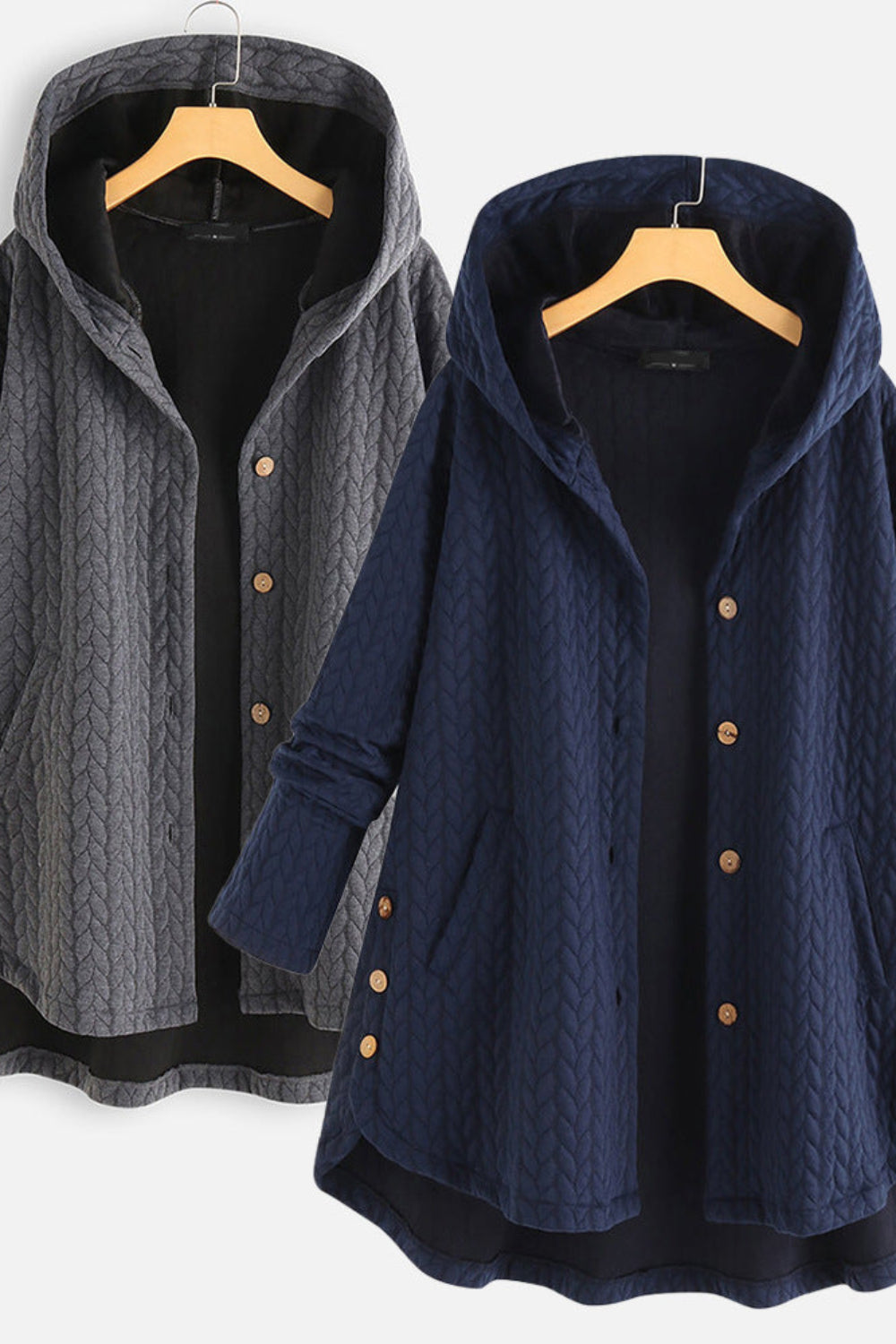 Two hooded jackets, one gray and one navy, on hangers against a white background.