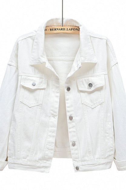 White denim jacket on a hanger with a white background