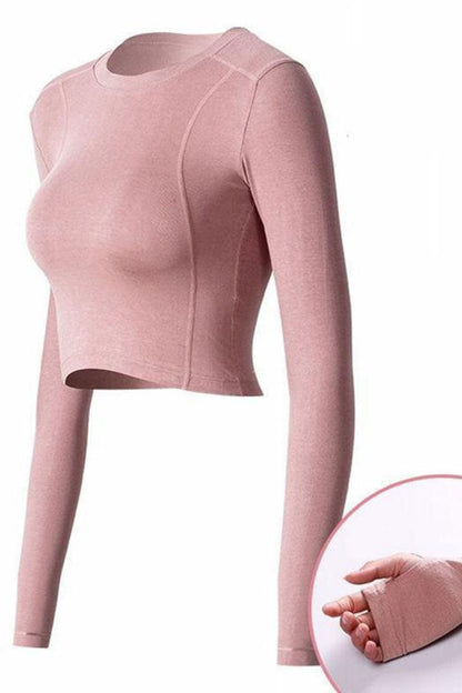 Pink long-sleeve top on a white background