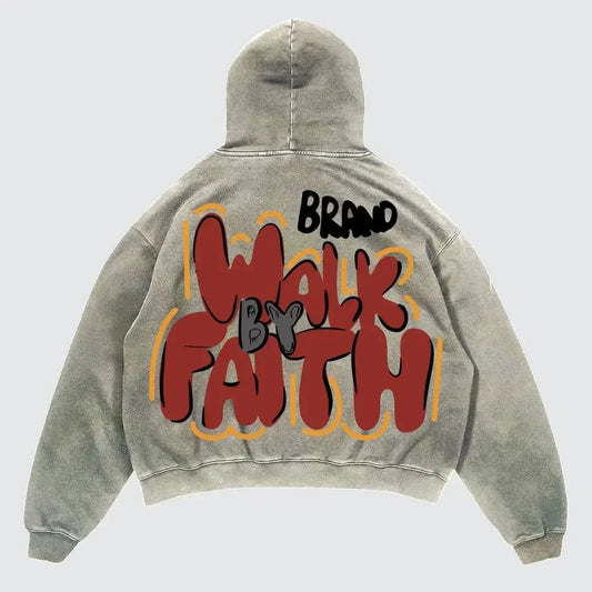 Gray hoodie with 'Walk by Faith' text on the back against a light gray background