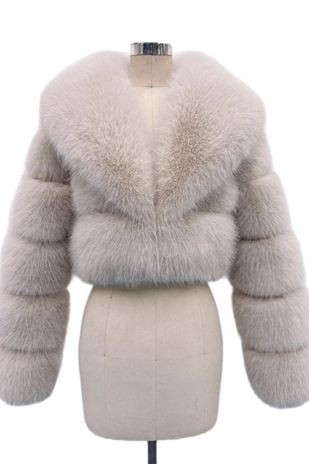 Light gray fur jacket on a mannequin against a white background