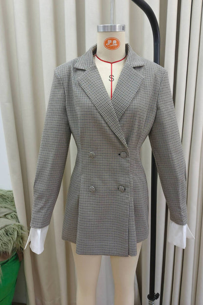 Gray checkered blazer on a mannequin against a neutral background