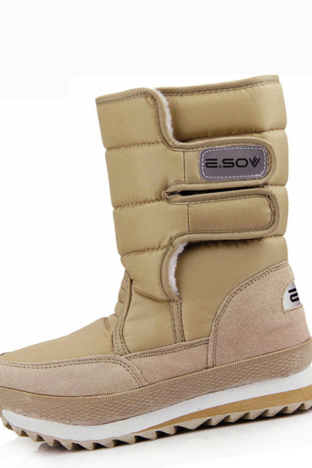 Beige winter boot with white sole on a white background