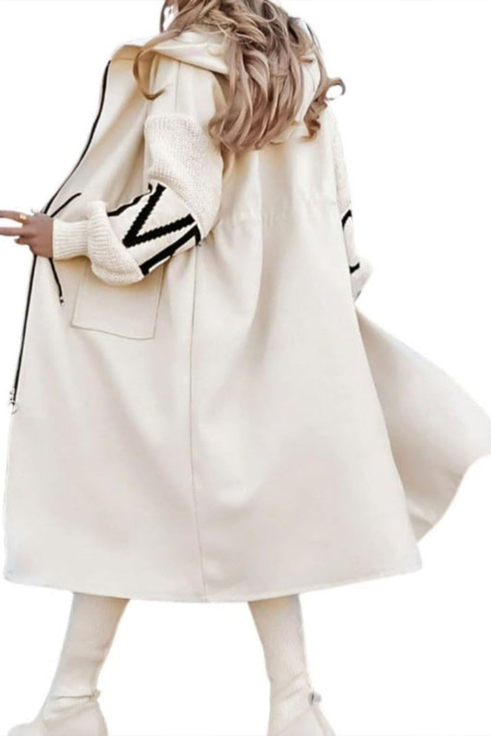 White coat with black lettering worn by a person on a white background