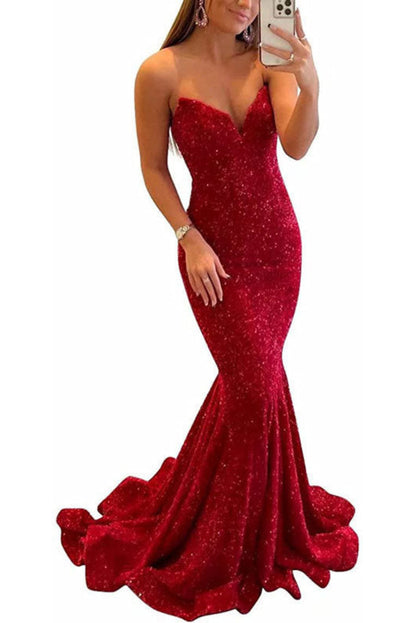 Red sparkly evening gown on a white background