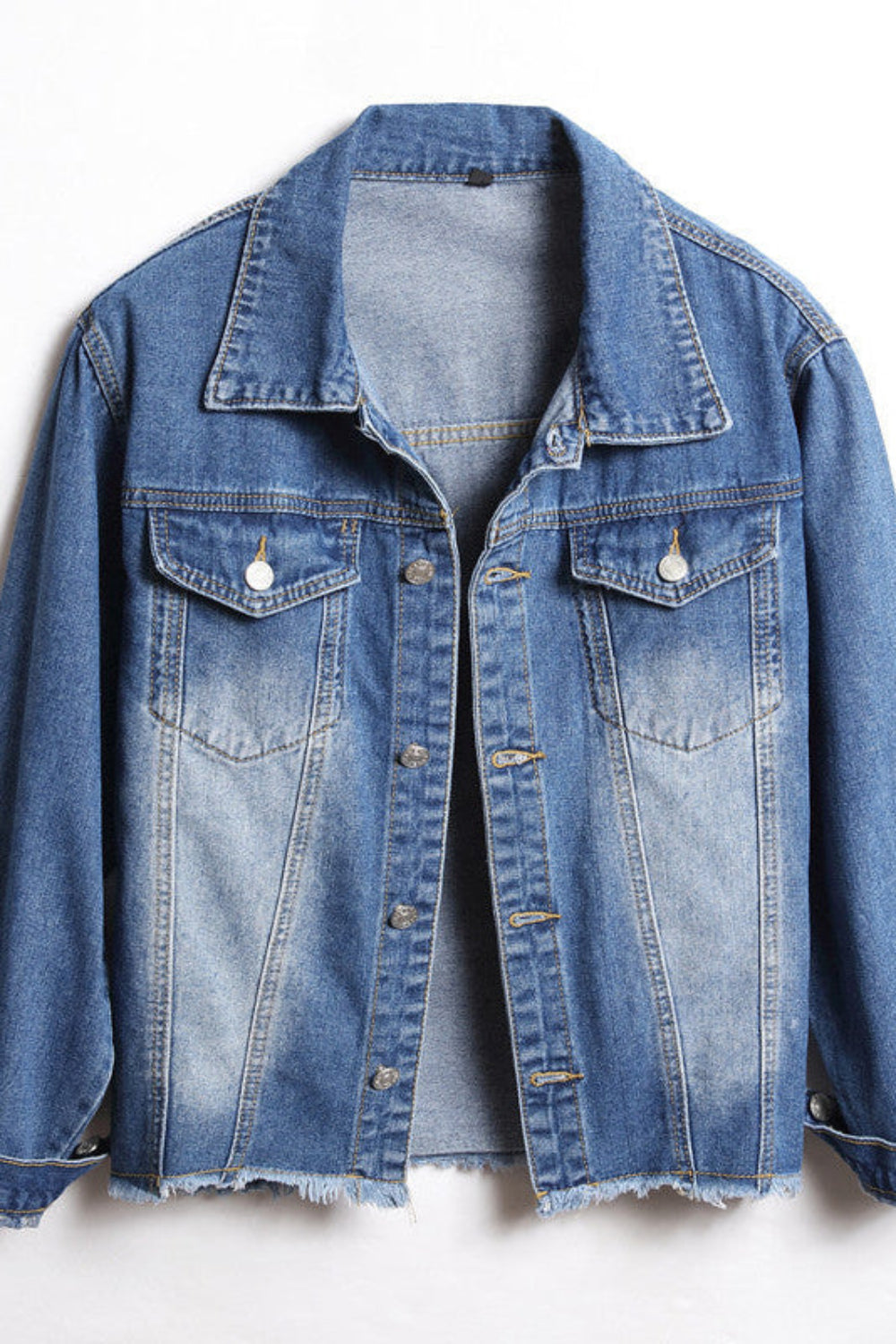 Blue denim jacket on a white background