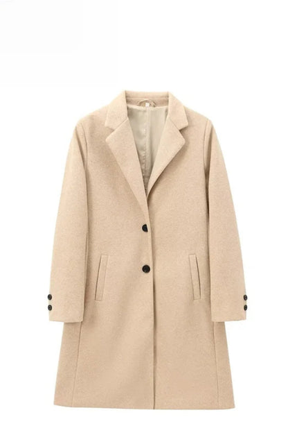 Beige coat with black buttons on a white background