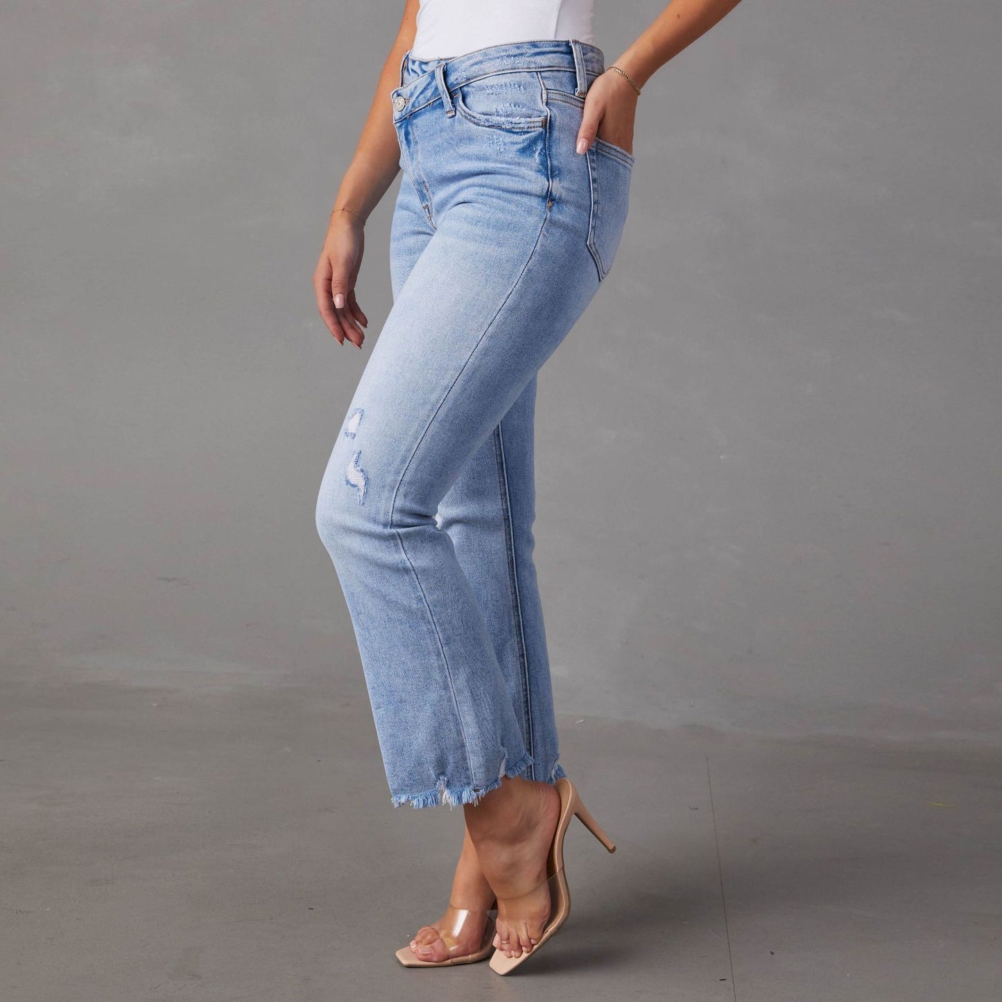 Distressed Light Wash High-Waist Jeans – Ripped Cotton Denim for Women
