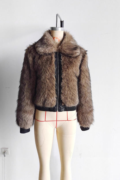 Brown fur jacket on a mannequin against a white background
