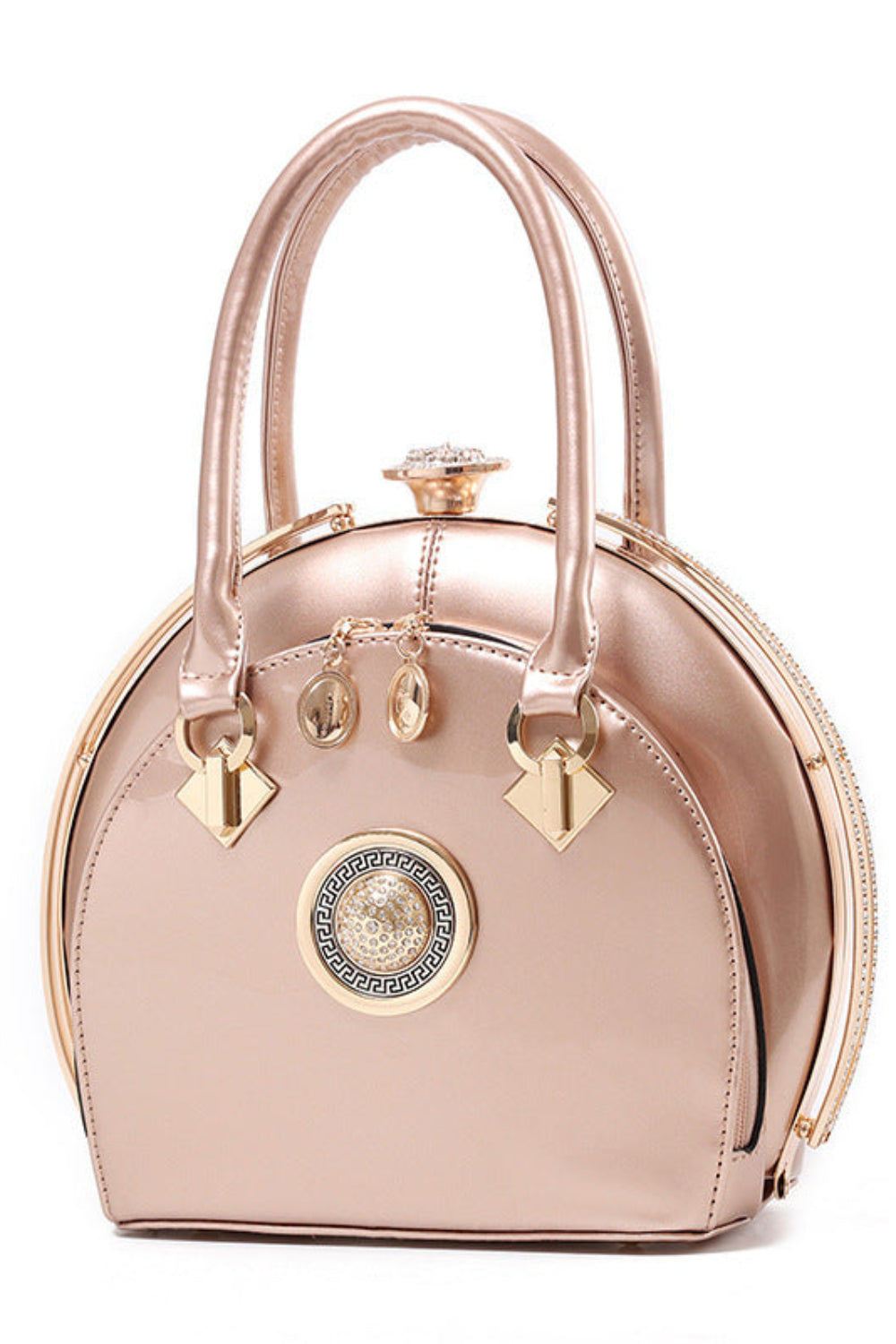 Rose gold handbag with decorative elements on a white background