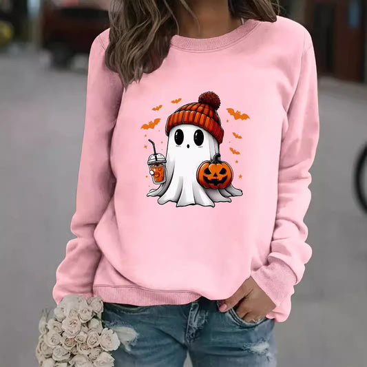 Person wearing a pink sweatshirt with a Halloween-themed ghost design.