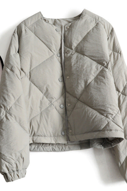 Gray quilted jacket on a white background