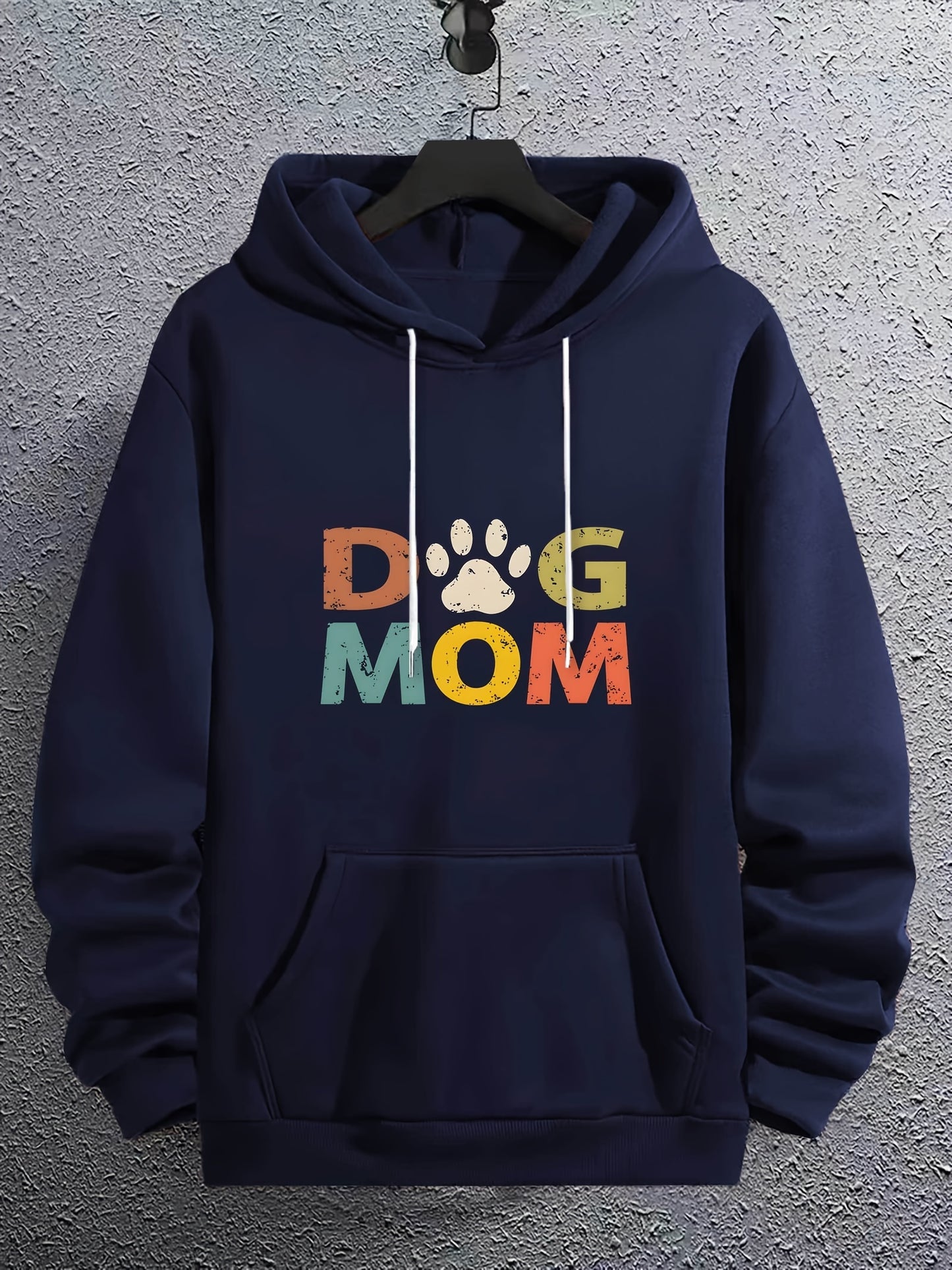 Navy blue hoodie with 'DOG MOM' text and paw print on a gray textured background