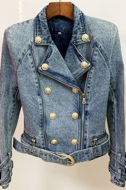 Blue denim jacket with gold buttons on a hanger against a white background