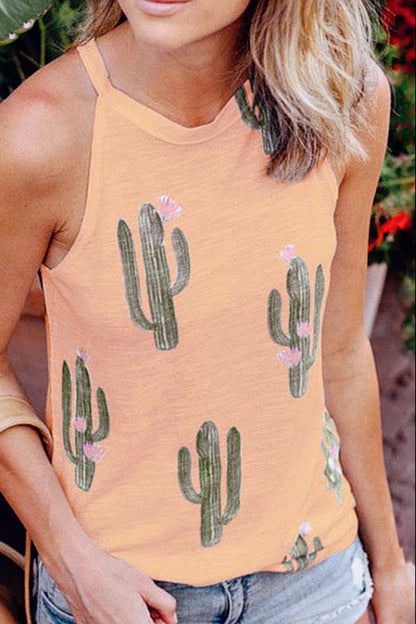 Person wearing a peach tank top with cactus pattern outdoors