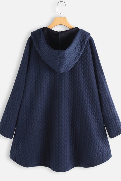 Navy blue hooded coat on a wooden hanger against a white background