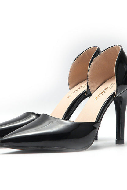 Black high-heeled shoes on a white background