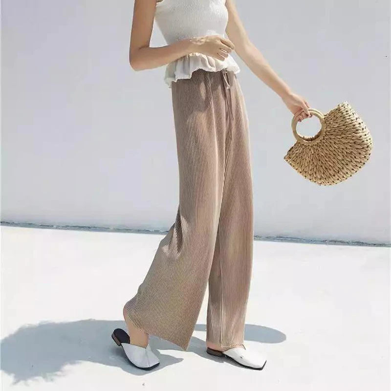 Flowy Teal Pleated Wide-Leg Pants for a Coastal Vacation Mood
