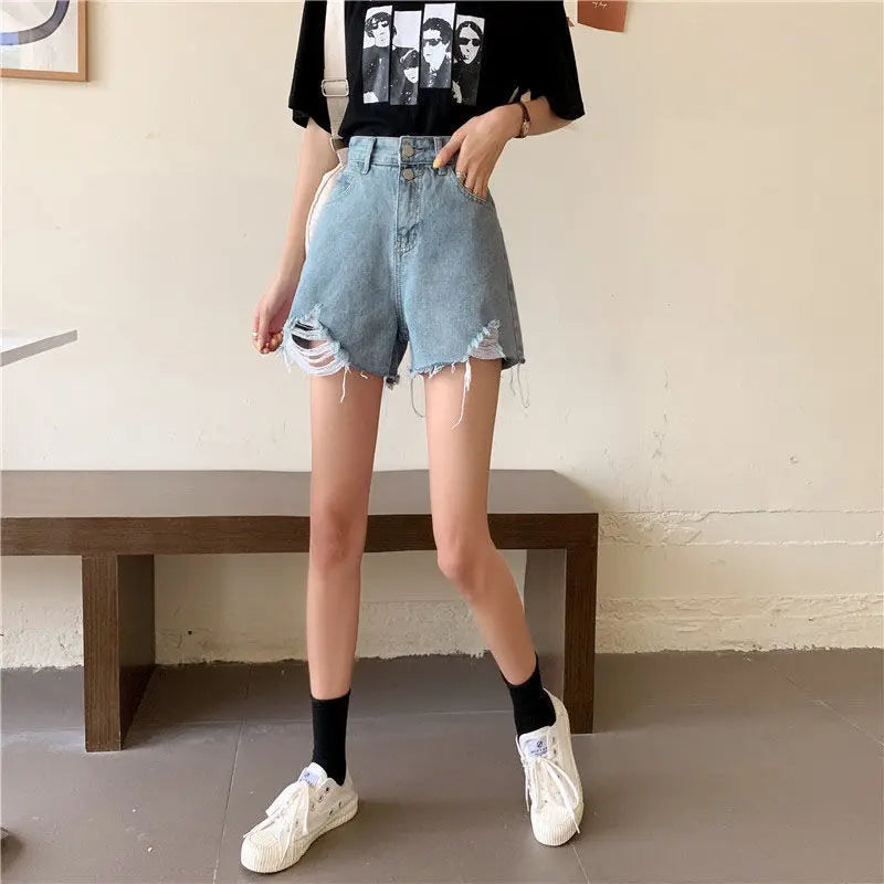90s Grunge Aesthetic: Distressed High-Waist White Denim Shorts
