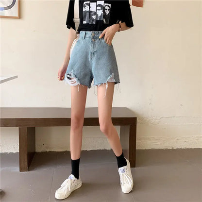 90s Grunge Aesthetic: Distressed High-Waist White Denim Shorts