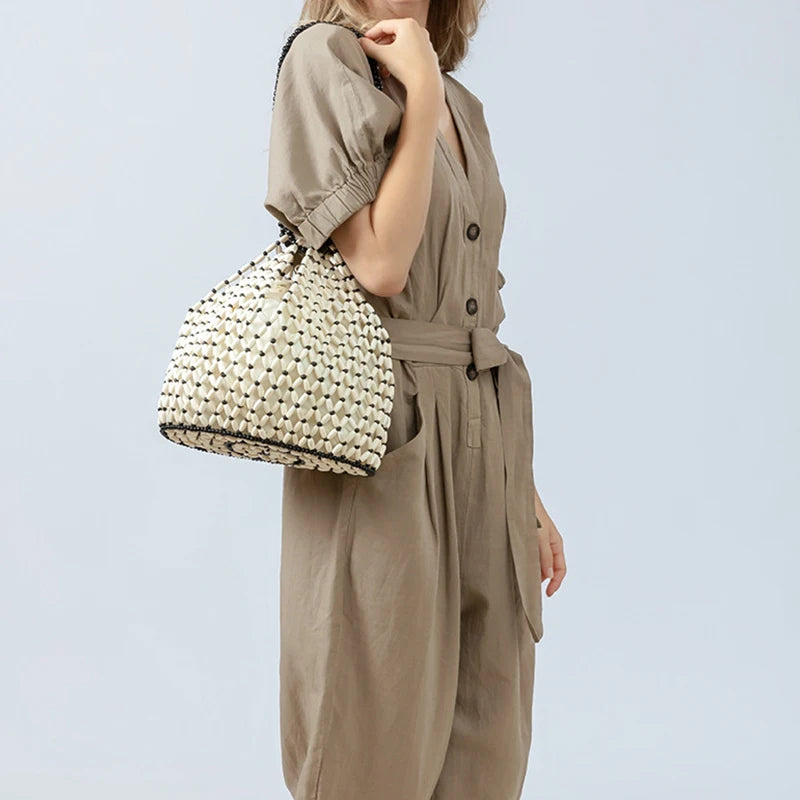Resort Aesthetics: Chic Pearl Handle Beaded Bag
