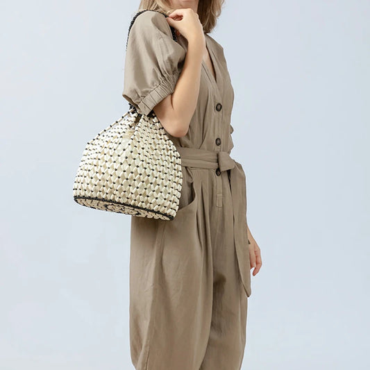 Resort Aesthetics: Chic Pearl Handle Beaded Bag
