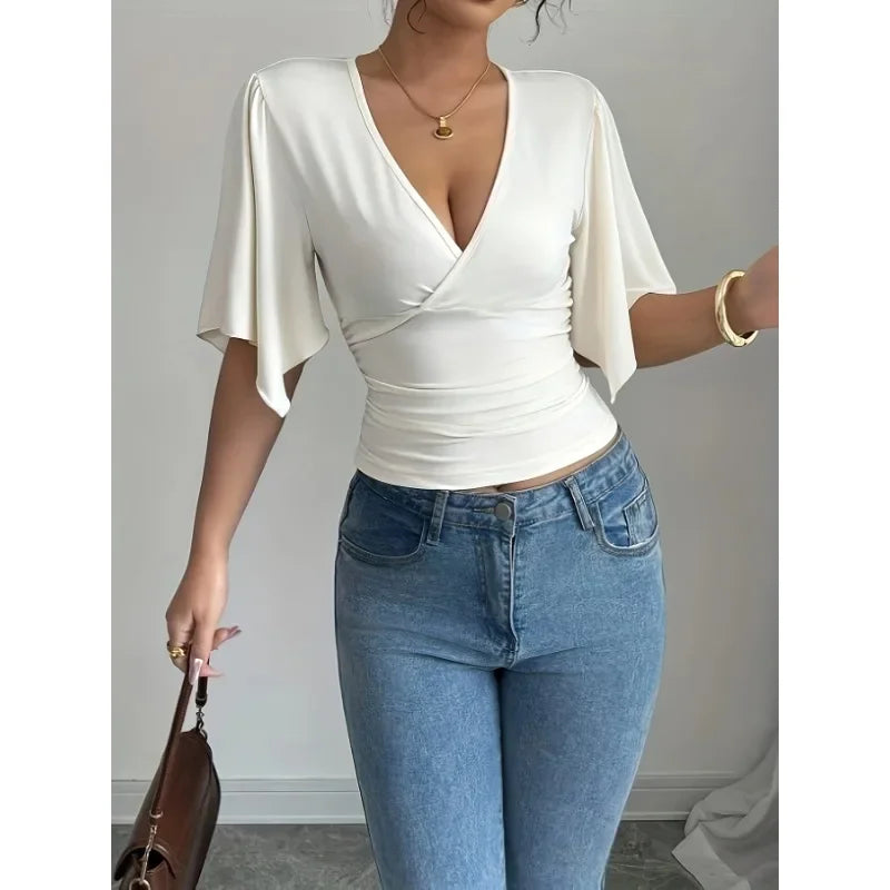 Modern Feminine: Slim-Fit V-Neck Shirred Knit Top