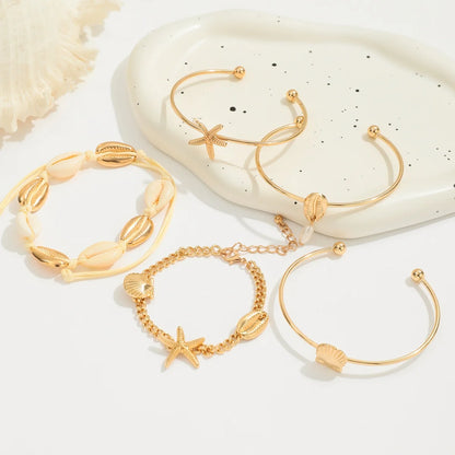 Greek Goddess Vibes - Elegant Gold Sea Shell Charm Bracelet Stack