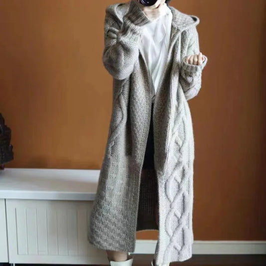 Sophisticated Layering: The Chic Sleeveless Hooded Knit Vest