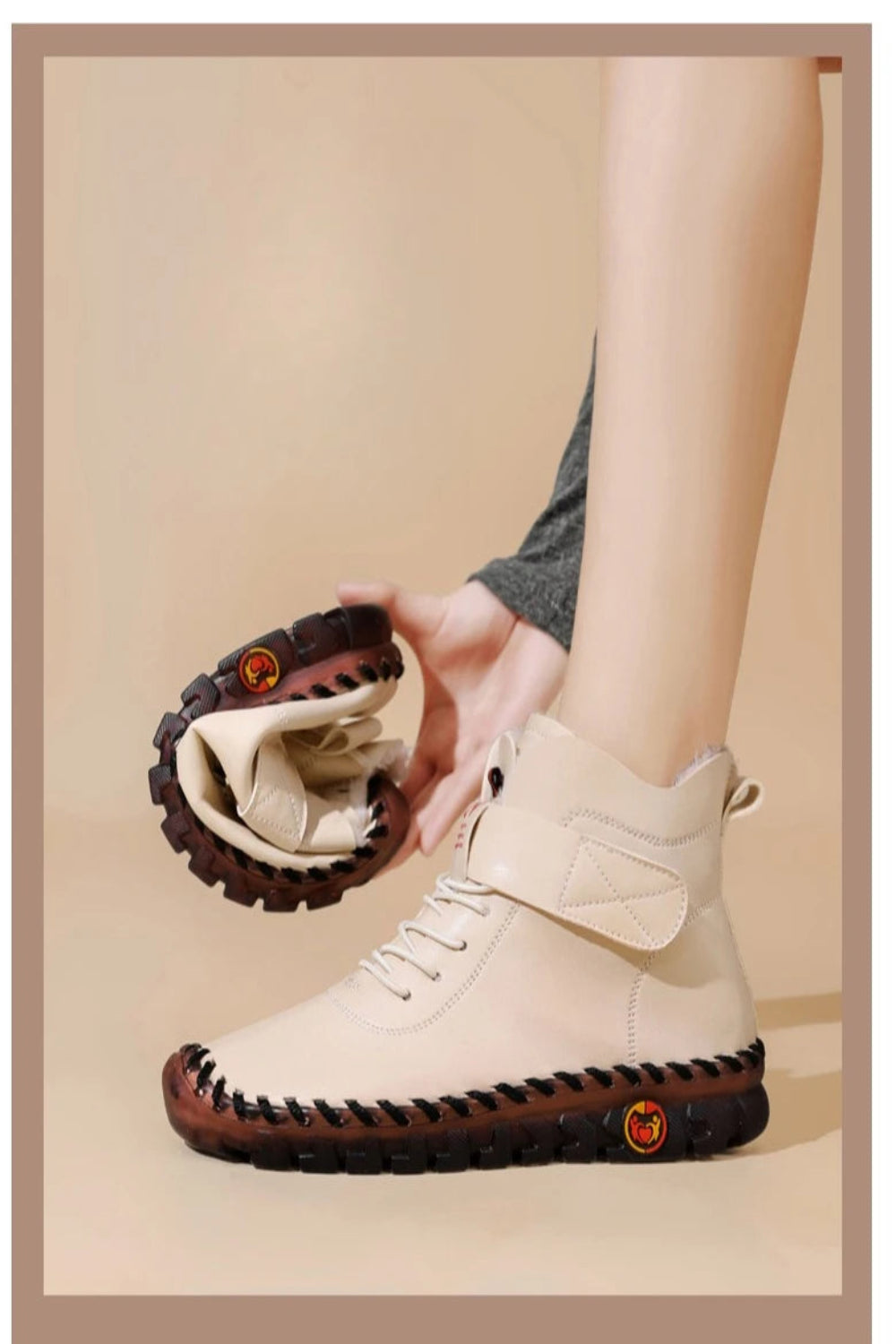 Beige ankle boot with brown accents on a beige background