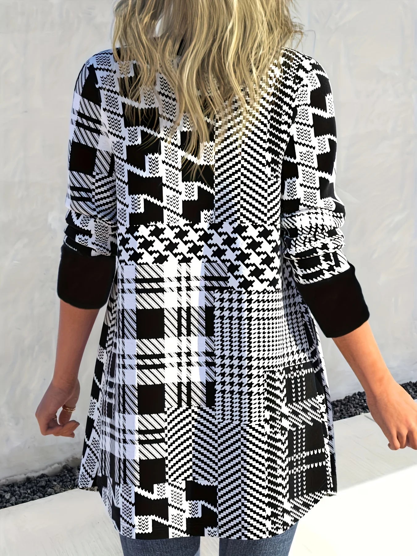 Bold Silhouette: Modern Geometric-Sleeve Knit Cardigan