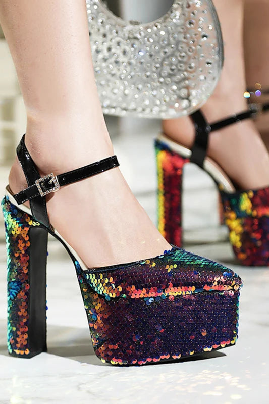 Multicolored sequin high-heeled shoe with platform on a white background