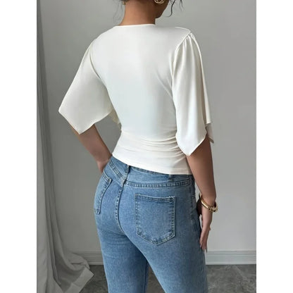 Modern Feminine: Slim-Fit V-Neck Shirred Knit Top