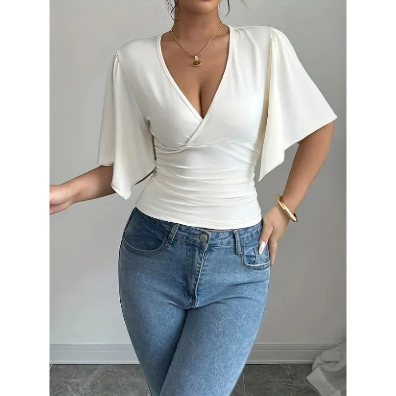 Modern Feminine: Slim-Fit V-Neck Shirred Knit Top