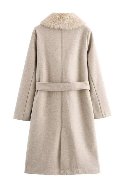 Beige coat with fur collar on a white background