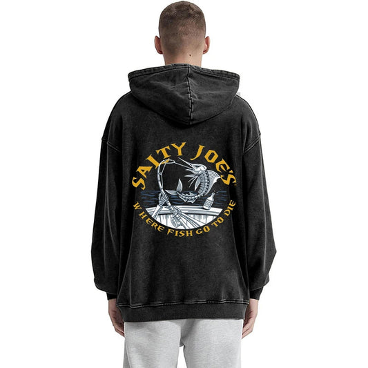 Person wearing a black hoodie with 'Salty Joe's' logo on the back, standing against a white background.