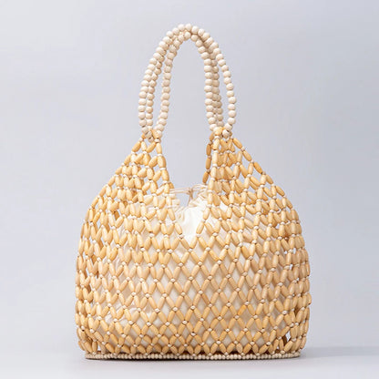 Resort Aesthetics: Chic Pearl Handle Beaded Bag