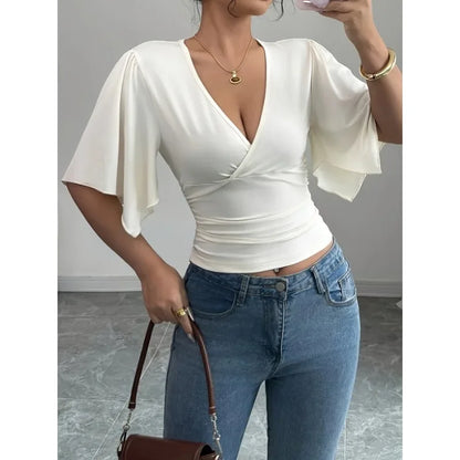 Modern Feminine: Slim-Fit V-Neck Shirred Knit Top