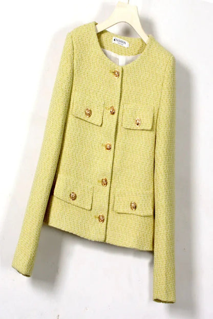 Yellow jacket with gold buttons on a white background