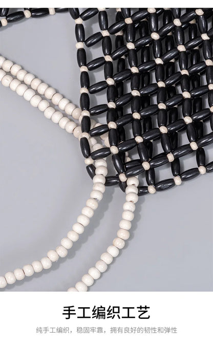 Resort Aesthetics: Chic Pearl Handle Beaded Bag