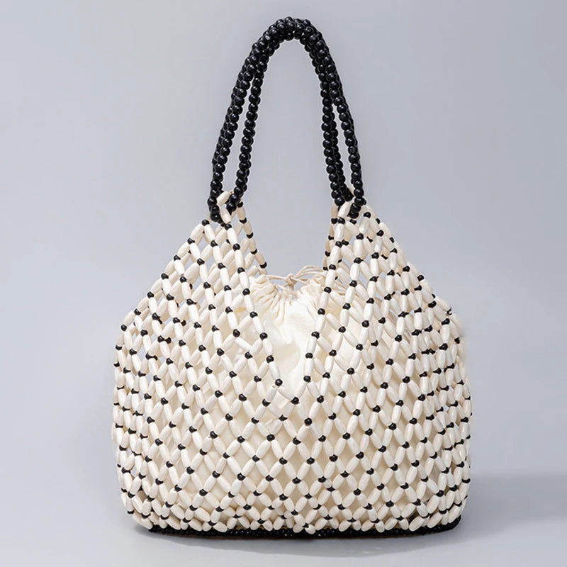 Resort Aesthetics: Chic Pearl Handle Beaded Bag