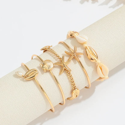 Greek Goddess Vibes - Elegant Gold Sea Shell Charm Bracelet Stack