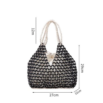 Resort Aesthetics: Chic Pearl Handle Beaded Bag